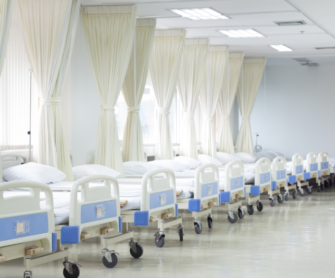 Hospital ward with beds in medical equipment